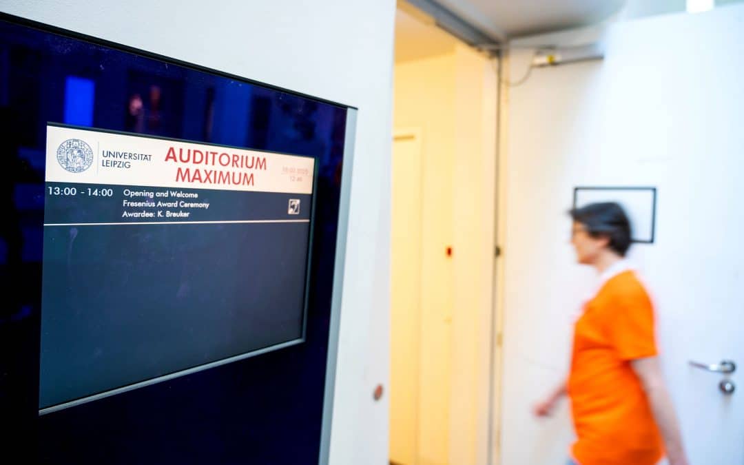 Fotograf in der Uni Leipzig